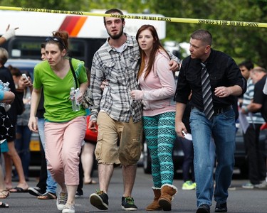 Parents and students are reunited after a shooting at Reynolds High School in Troutdale, Oregon June 10,  2014.  REUTERS/Steve Dipaola
