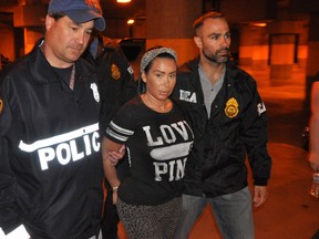 Samantha Barbash being arrested. 

(AP/DEA)