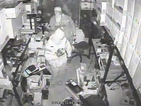 A still from a video released by police shows two suspects in a recent break and enter. Police are asking for the public​'s help in identifying the suspects.