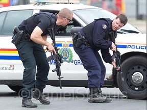 Moncton RCMP officers in position during the manhunt for gunman Justin Bourque. (photo courtesy of Daniel St. Louis)