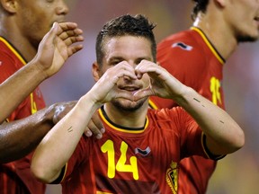 Belgium's Dries Mertens reacts after scoring against Tunisia during their international friendly soccer match in Brussels June 7, 2014. (REUTERS/Laurent Dubrule)