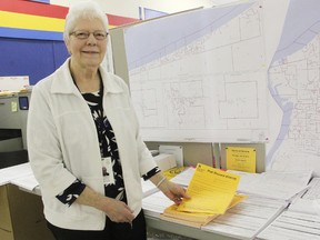 Maps and oodles of materials, including poll record books, were ready to move out of the Elections Ontario office at Devine and Indian Wednesday. Sheila Henderson, returning officer for the Sarnia-Lambton riding, is again heading the massive organizational undertaking. (TYLER KULA, The Observer)