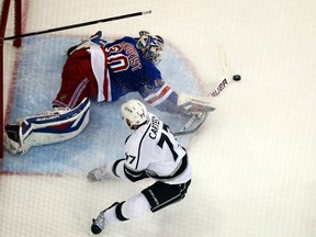 New York Rangers goalie Henrik Lundqvist makes a save on Los Angeles Kings' Jeff Carter during the second period in Game 4 of their NHL Stanley Cup final game on June 11. (REUTERS/Shannon Stapleton)