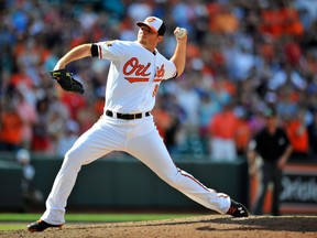 Baltimore Orioles pitcher Zach Britton pitches in the ninth inning against the Cleveland Indians at Oriole Park at Camden Yards on May 25, 2014. The Orioles defeated the Indians 4-2. (JOY R. ABSALON/USA TODAY Sports)