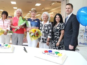 Gino Donato/The Sudbury Star
Sears 40-year employees, from left, Paulette Lalonde, Maureen Jokinen, Phyllis Mackey and Irene Alexander, celebrate with Sears New Sudbury Centre general manager Lynn Kurkimaki, and Doug Campbell, president and CEO of Sears Canada. Sears is celebrating the 40th anniversary in Sudbury.