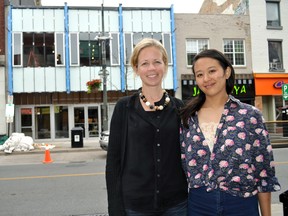 DNA Artspace owner Allison Matic and gallery manager Thea Yabut stand near their new location on Dundas Street in London, Ont. June 11, 2014. The new gallery opens with an exhibit featuring Canadian sculptor John McEwen during Nuit Blanche June 14 then celebrates its official grand opening June 20. CHRIS MONTANINI\LONDONER\QMI AGENCY