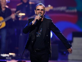 Ringo Starr, drummer for The Beatles, performs during the taping of "The Night That Changed America: A Grammy Salute To The Beatles", which commemorates the 50th anniversary of The Beatles appearance on the Ed Sullivan Show, in Los Angeles January 27, 2014.  REUTERS/Mario Anzuoni (