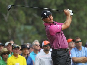 Graeme McDowell watches his tee shot on the eighth hole during the first round of the U.S. Open in Pinehurst, N.C., on Thursday, June 12, 2014. (Robert Galbraith/Reuters)
