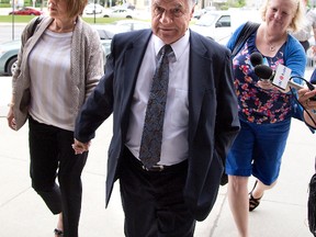 Mayor Joe Fontana is accompanied by his wife Vicky as he walks to the courthouse London, Ont.

DEREK RUTTAN/QMI AGENCY