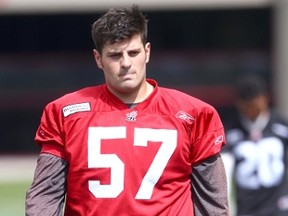 Stampeders offensive lineman Billy Peach, who played at Frontenac Secondary, at practice at McMahon Stadium in Calgary on Wednesday. (Darren Makowichuk/QMI Agency)