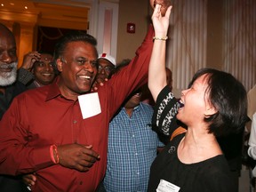 Liberal Bas Balkissoon wins his riding of Scarborough-Rouge River and arrives to a cheering crowd at the Scarborough Convention Centre on June 12, 2014. (Veronica Henri/Toronto Sun)