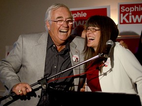 Longtime Liberal MPP John Gerretsen shares a laugh with incoming MPP Sophie Kiwala after she was elected to represent Kingston and the Islands in Thursday's provincial election. (Alex Pickering/For The Whig-Standard)