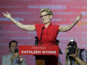 Premier Kathleen Wynne celebrates the Liberal victory in Toronto on Thursday, June 12, 2014. (Craig Robertson/Toronto Sun)