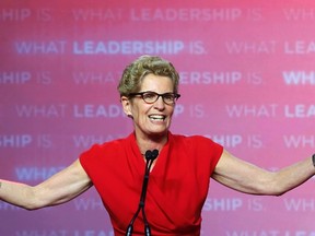 Ontario Liberal Party leader Kathleen Wynne thanks supporters at her election party headquarters in Toronto, June 12, 2014. The Liberals won a majority government with Wynne becoming the first woman and gay premier of Ontario.      REUTERS/Mark Blinch (