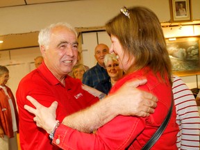 Lou Rinaldi hugs a supporter as he arrives at the Brighton Legion, following his win in the Northumberland-Quinte West riding Thursday evening. 
EMILY MOUNTNEY/QMI Agency