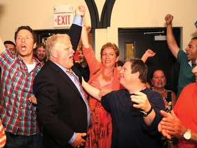 Sudbury MPP elect Joe Cimino, left, celebrates his victory with supporters and Nickel Belt MPP elect France Gelinas at the Caruso Club in Sudbury, Ont. on Thursday, June 12, 2014. Cimino announced his resignation from the legislature on Thursday. JOHN LAPPA/THE SUDBURY STAR/QMI AGENCY