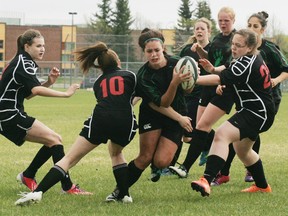Spruce Grove Composite’s girls rugby team came away with silver medals in the Metro City championships, nearly upsetting a much more-experienced Fort Saskatchewan team. - Gord Montgomery, File Photo