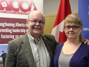 Leah Bignell stands with Rick Carlson, president of Design Pics, during a Career Focus funding announcement on June 6 in Stony Plain. Bignell received similar funding in 2012 that provided for her paid internship with Design Pics. - Karen Haynes, Reporter/Examiner