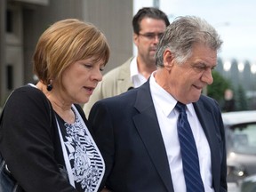 London mayor Joe Fontana walks out of the court house with his wife, Vicky, after being found guilty on three fraud related charges in London, Ontario on Friday June 13, 2014. Fontana will be sentenced on July 15. CRAIG GLOVER/The London Free Press/QMI Agency