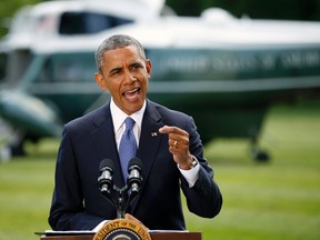 U.S. President Barack Obama speaks about the situation in Iraq from the South Lawn of the White House in Washington June 13, 2014. REUTERS/Kevin Lamarque