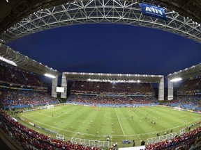 A picture shows a general view of the Pantanal Arena in Cuiaba before the start of the Group B football match between Chile and Australia during the 2014 FIFA World Cup on June 13, 2014. (AFP PHOTO/JUAN BARRETO)