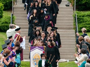 Graduates of Brescia University College follow a bagpiper down the steps of the college on their way to convocation in this 2011 file photo. A PoV in last week?s paper chastising students who complain about tuition fees has irked some letter writers. They seem to agree that taxpayer investment in education is good for society and is money well spent. (CRAIG GLOVER, The London Free Press)