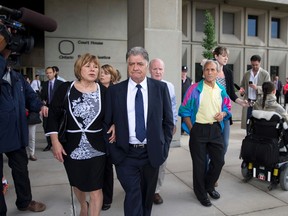 London mayor Joe Fontana leaves the court house with his wife, Vicky, after being found guilty on three fraud related charges in London, Ontario on Friday June 13, 2014.  Fontana will be sentenced on July 15. (Free Press file photo)