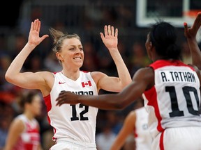 Lizanne Murphy, shown here celebrating a successful three-pointer at the London Olympics, plays in France's top pro women's basketball league. (Reuters)