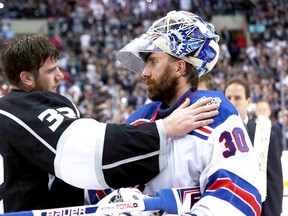 Kings goalie Jonathan Quick consoles Rangers netminder Henrik Lundqvist after L.A. won the Stanley Cup in double overtime. (Getty Images/AFP)
