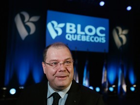 Mario Beaulieu smiles after being named the new leader of the Bloc Quebecois in Montreal, June 14, 2014. According to local media, the Bloc shrank down to four seats in the Commons after the 2011 election from the 49 seats clinched in the 2008 vote. REUTERS/Christinne Muschi