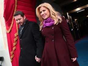 Singer Kelly Clarkson and Brandon Blackstock arrive at the second presidential inauguration of President Barack Obama on the West Front of the U.S. Capitol in Washington in this January 21, 2013 file photo. REUTERS/Win McNamee/Pool/Files