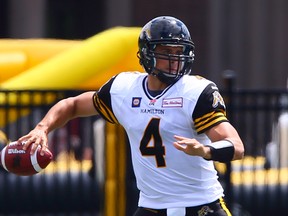 Zach Collaros of the Hamilton Tiger-Cats prepares to pass against the Montreal Alouettes in CFL pre-season action on June 14. (Dave Abel, QMI Agency)