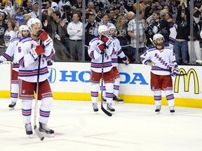 New York Rangers look dejected after losing the Stanley Cup final to the Los Angeles Kings in double-overtime on Friday night. (Gary A. Vasquez/USA TODAY Sports)