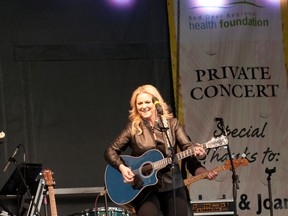 Multi award-winning singer-songwriter Carolyn Dawn Johnson performed at last weekend's "For the Love of Children" Charity Golf Classic in Red Deer.   (ADRIENNEMARIE.ca)