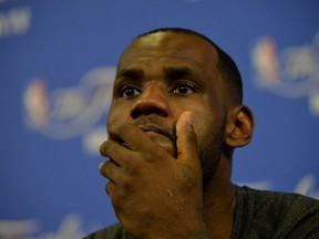 Miami Heat star LeBron James speaks to the media after his team’s Game 4 loss to the San Antonio Spurs. (Steve Mitchell/USA TODAY Sports)