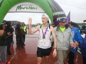 Brian Walker, of Winnipeg, won the Manitoba Marathon with a time of 2::36:44:0.  Sunday,  June 15, 2014. (Chris Procaylo/Winnipeg Sun/QMI Agency)