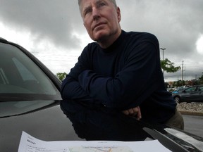 Duncan MacDonald poses for a photo on Friday June 13, 2014. Duncan was surprised to receive a over-priced bill for using the toll on highway 407 near Toronto.
Tony Caldwell/Ottawa Sun/QMI Agency