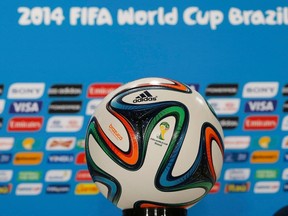 The official World Cup soccer ball is pictured during a news conference of the Colombian team in Belo Horizonte, June 13, 2014. (REUTERS/Leonhard Foeger)