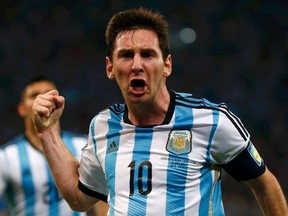 Argentina's Lionel Messi celebrates scoring a goal during the 2014 World Cup Group F soccer match against Bosnia and Herzegovina at the Maracana stadium in Rio de Janeiro June 15, 2014. (REUTERS/Michael Dalder)
