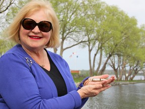 Sherry Pringle of Napanee holds a sailor’s whistle recovered more than 70 years ago from the remains of the HMCS Athabaskan. Pringle’s uncle, Maurice Waitson, was one of the sailors served and perished on the destroyer when it was torpedoed in the English Channel on April 29, 1944. (Julia McKay/The Whig-Standard)