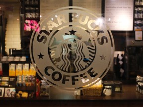 The logo of a Starbucks coffee shop is seen in New York in this June 25, 2013 file photo. (REUTERS/Brendan McDermid)