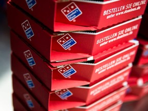 Delivery boxes are stacked at a Domino's Pizza store.
REUTERS/Thomas Peter
