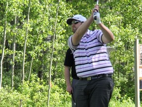 Nick Kazmir takes a swing on his way to victory during the annual Oilmen’s Association golf tournament held June 6-8. Kazmir went on to claim the championship.