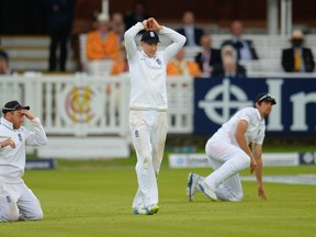England players react after Sri Lanka drew the first cricket Test in London on Monday. (Philip Brown/Reuters)