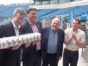 Can-Am League commissioner Miles Wolff (left) unveiled the expansion team's new name, Ottawa Champions, with Mayor Jim Watson, team president David Gourlay, Coun. Peter Clark and Coun. Mathieu Fleury at the Ottawa Stadium on Monday. Jon Willing/Ottawa Sun