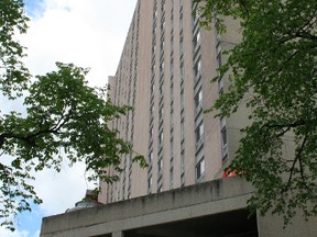 A suspect police say was evading arrest fell from a ninth-storey window at 360 Cumberland Ave., landing on top of the third-floor parkade. He is in stable condition at hospital in Winnipeg. (KRISTIN ANNABLE/WINNIPEG SUN/QMI AGENCY)