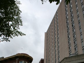 A suspect police say was evading arrest fell from a ninth-storey window at 360 Cumberland Ave., landing on top of the third-floor parkade. He is in stable condition at hospital in Winnipeg following the June 15, 2014 incident. (KRISTIN ANNABLE/WINNIPEG SUN/QMI AGENCY)