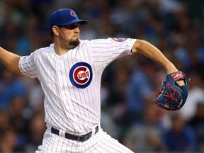 Chicago Cubs pitcher Jason Hammel throws a pitch against the New York Yankees during the first inning at Wrigley Field on May 20, 2014. (JERRY LAI/USA TODAY Sports)