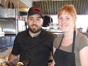 Harold Carmichael/The Sudbury Star
Forken Spoon co-owner Matt Facendi, left, and employee Teegan Edmonds hold up Korean barbecue wraps in the kitchen area of the new restaurant at the corner of Larch and Durham Streets.