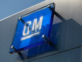 The General Motors logo is seen outside its headquarters at the Renaissance Center in Detroit, Michigan in this file photograph taken August 25, 2009. (REUTERS/Jeff Kowalsky/Files)